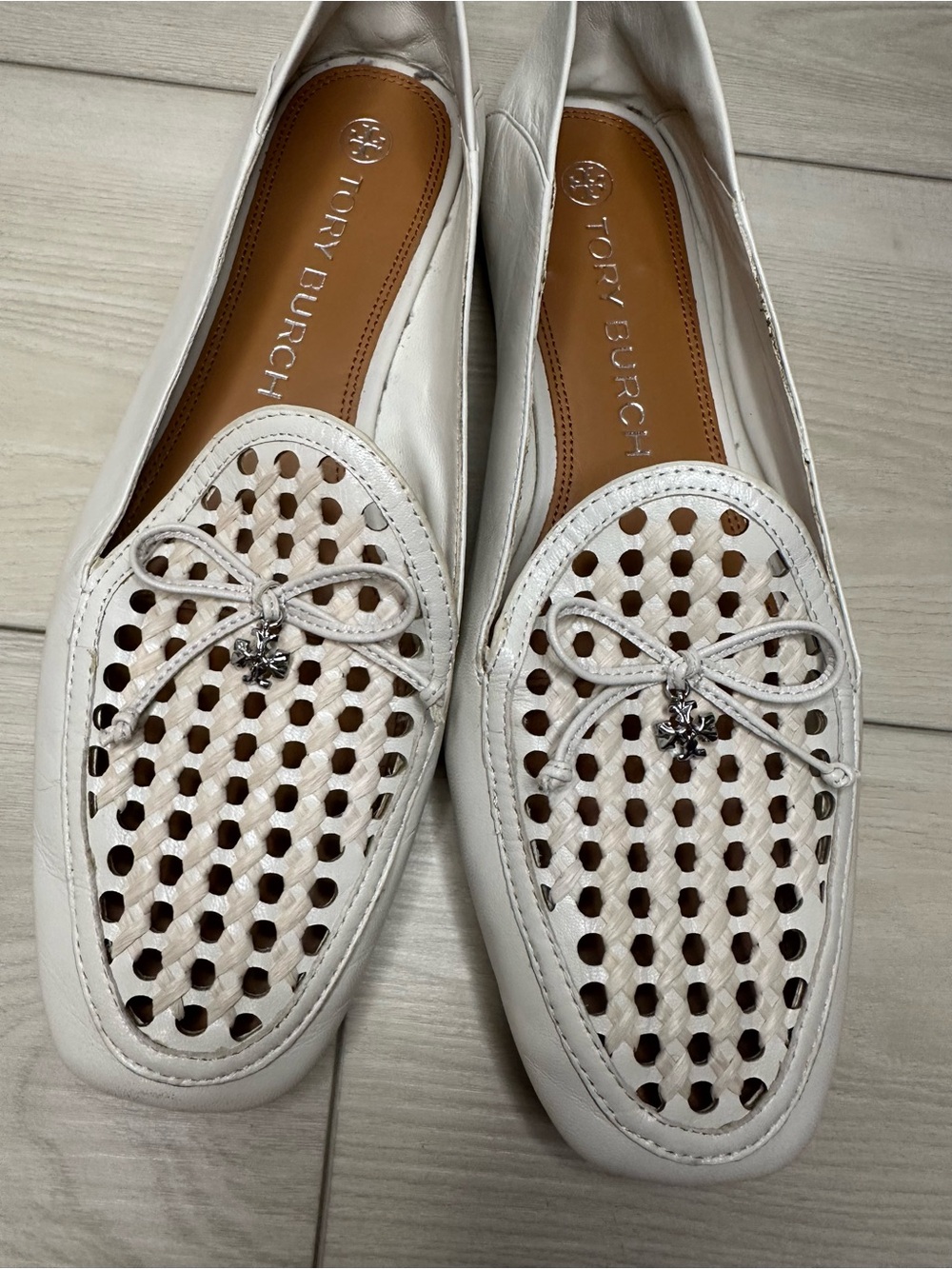 Tory Burch White Perforated Leather Loafers with Bow and Logo Charm